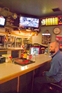 abi stomberg | rawr University of Idaho Law student Pete Thomas takes a break and has a brew at the Corner Club on Monday. The bar was ranked fifth in the nation for best college bars.